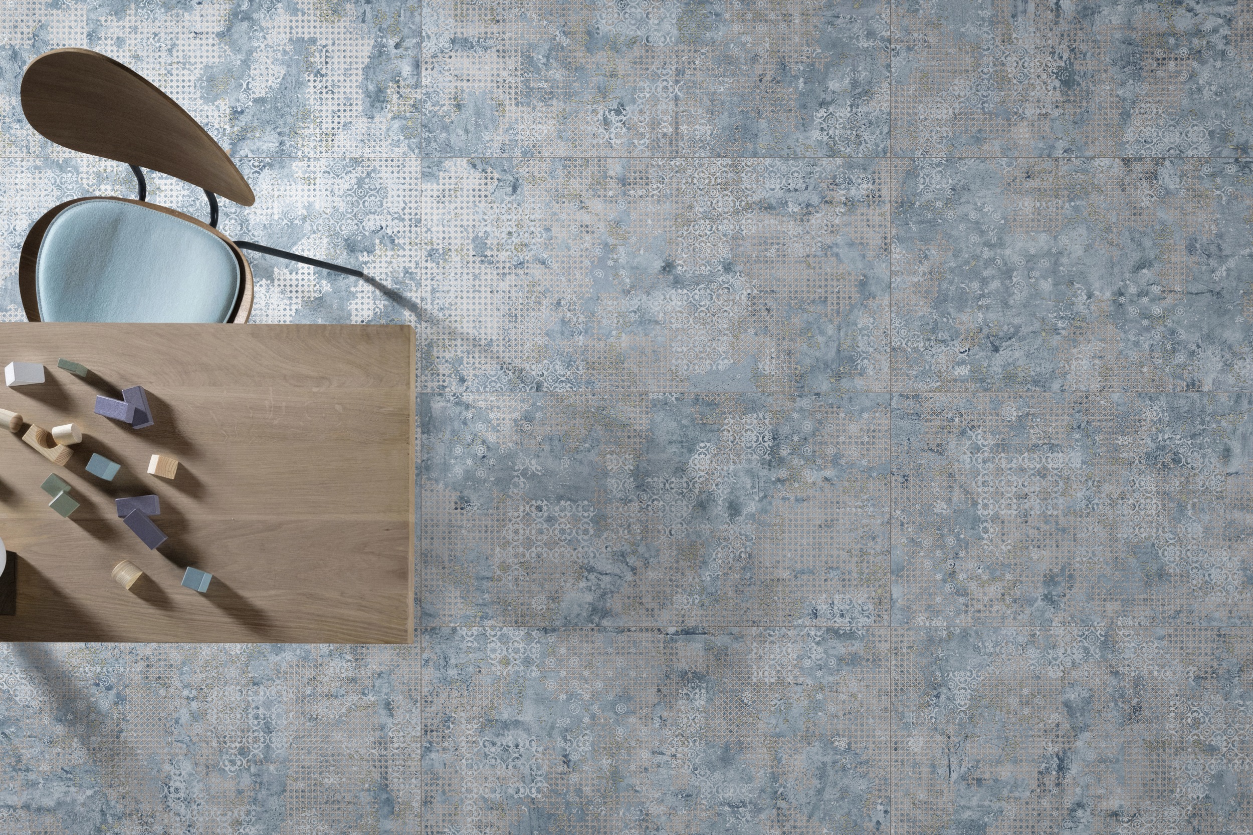 Bodenfliesen Teppichoptik Rug Blue im Wohnzimmer Fliese Vintageoptik blau Ambiente