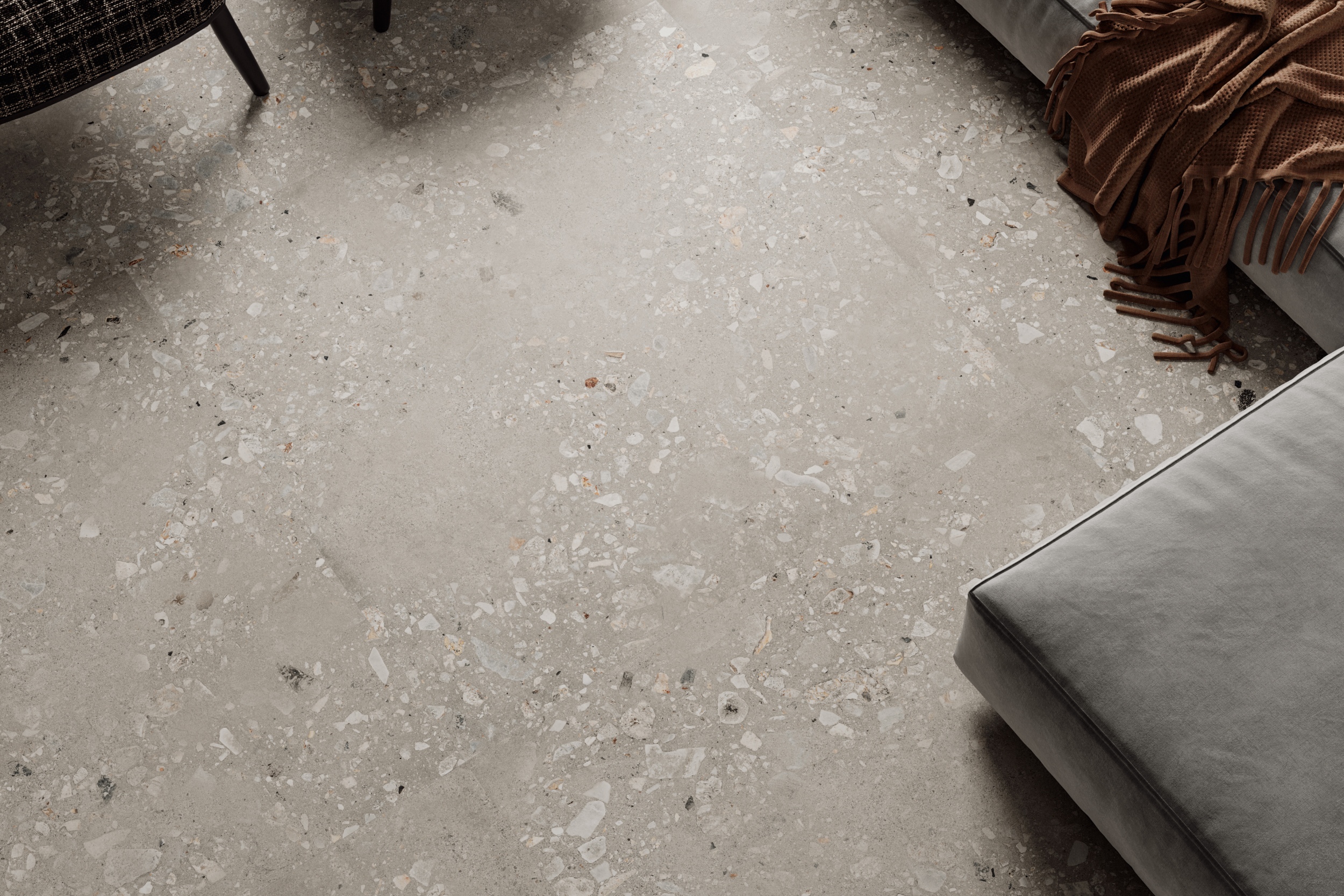 Fliese Terrazzo-Optik Logico Cosmo Cement Sant Agostino grau-braun im Wohnzimmer