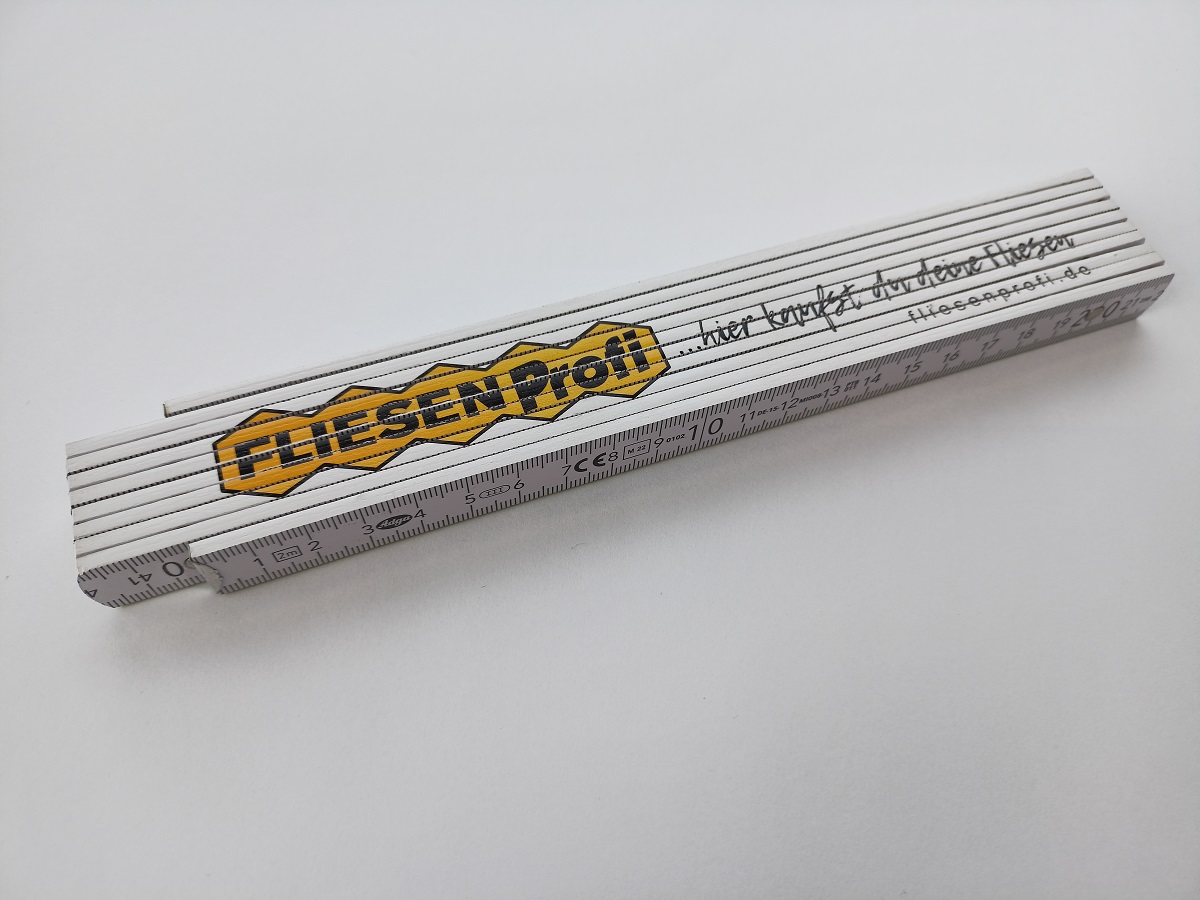 Zollstock mit Fliesenprofi-Logo