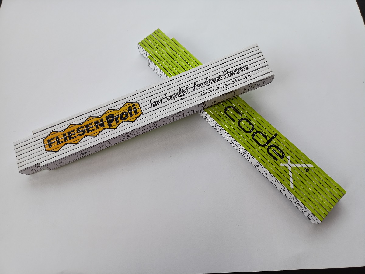 Zollstock mit Fliesenprofi-Logo